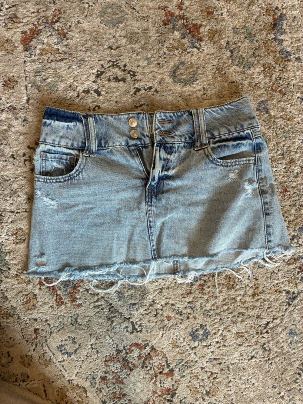 Light Wash Distressed Denim Mini Skirt